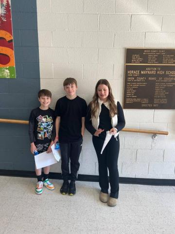6th Grade students Mason Adkins, Braden Coaker, and Presley Wyrick