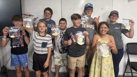 4-H youth with their homemade butter 