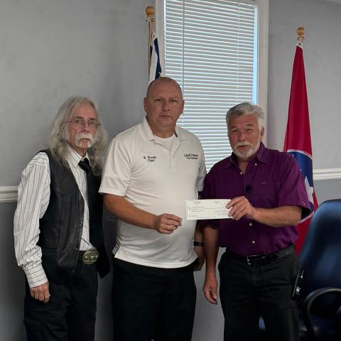 Vice Mayor Phillips, Brad Woods, Mayor Beeler. Plainview awards $10,000 to LVFD