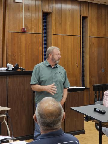 Mark Cook, the new Veterans Service officer, addresses Commission.