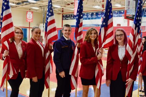 Union County High School students Kelly Wynn, Marissa Corum, Isaiah Hipsher, Brianna Hurst and Rachel Hancock get ready for the opening processional.