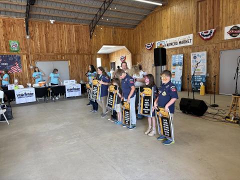 2026 Scouts helping to educate attendees
