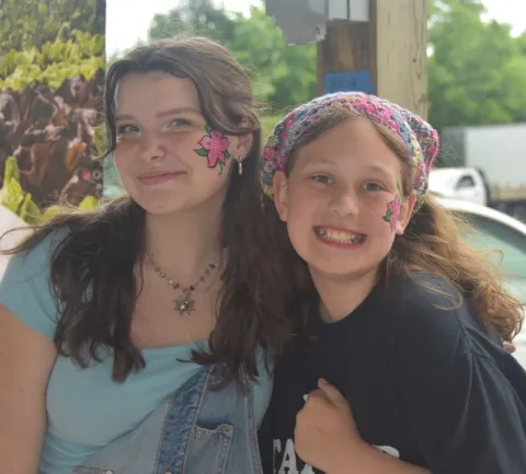 Painted faces. Photo by Carol Aldrich