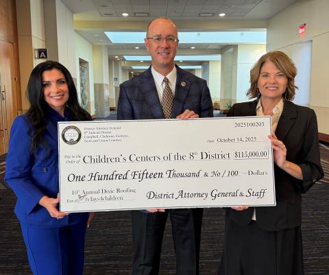 Photo submited by Office of District Attorney General 8th Judicial District Angel Sexton, Director of the Children’s Center of the Cumberlands; Jared Effler, District Attorney General; Tracie Davis, Director of the Campbell County Children’s Center.