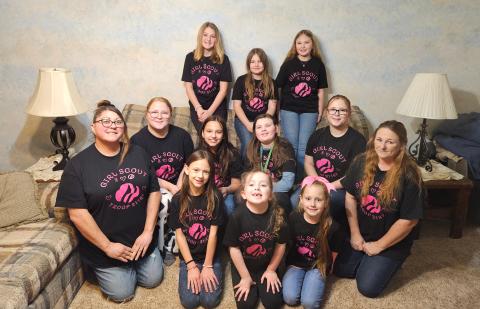 Photo by Earleen Wolfenbarger Front row: Emma, Allie, Mary Middle row: co-leader Kristina, Sarah, Layla, Katelyn, Loretta, Troop Leader Michelle Back row: Alexis, Zoe, viper