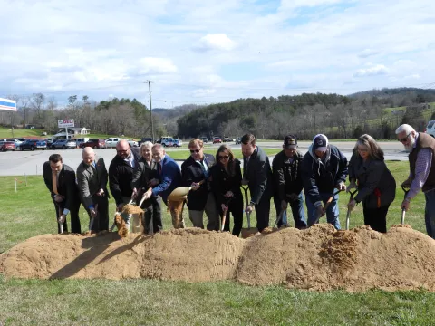 SR 33 Groundbreaking group of people shoveling dirt to symbolically begin construction on a highway