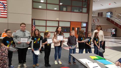 Paulette Elementary Beta Club A group of children and their teacher at a meeting