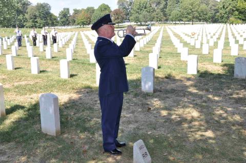 Taps in veterans cemetery Taps in veterans cemetery