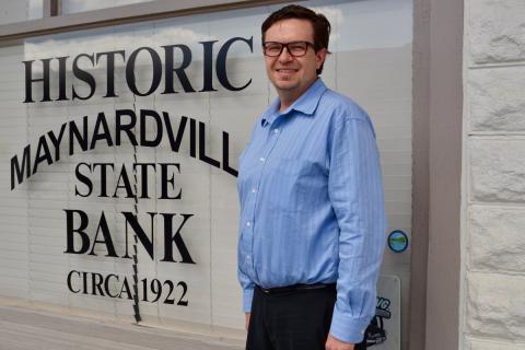 Interim Chamber of Commerce president Thomas Skibinski stands in front of the Chamber's office, currently housed in the historic Maynardville State Bank building.