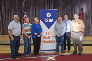 left to right is Board Member Terry Washam (2nd District), Board Chair Jessica Buck (3rd District), Vice Chair Rebecca Lock (7th District), Charlie Hamilton (1st District), Dr. Jimmy Carter (4th District), and Harold Cooke (6th District). 