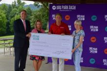 Mayor Mike Williams, Debra Keck, Randy Boyd and Tammy Rouse at the check presentation for a grant-funded dog park at Wilson Park