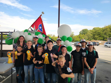 Back Row (left to right): Sarah Stokely-Cook (4-H Agent), Colt Davis, Sam Davidson, Madeleine Groce, Bennett Smith Middle Row (left to right): Coral Davis, Aspen Davis, Asher Firkin, Caleb Miller, Jaxson Moore, Jude Firkin, Virginia Firkin Front Row: Caleb Firkin Not Pictured: Ariona Payne & Brandon Davis (4-H Volunteer Leader)
