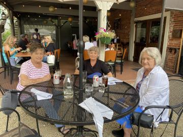 Sisters on the Purple Onion patio.