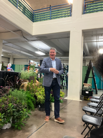 Larsen Jay CEO & Founder of Random Acts of Flowers talking to the Eastern Region of FCE Clubs during the TVA Fair September 9th.