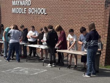 Ms. Susan Coffey's class outside working on STEM projects during summer school. Making learning fun! 