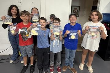 4-H youth with their homemade butter