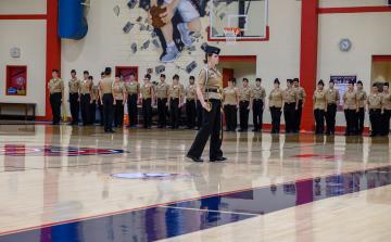 Kailei Beeler is shown leading her fellow JROTC members as they compete in their Annual Military Inspection.