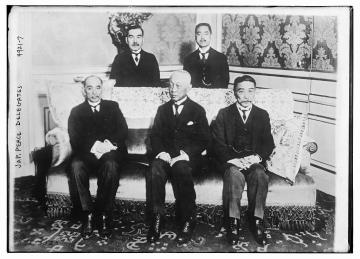 Photograph shows the Japanese delegates to the Paris Peace Conference in 1919. Standing (left to right): Ijuin Hikokichi and Matsui Keishiro; seated (left to right): Baron Makino Nobuaki, Prince Saionji Kinmochi and Viscount Chinda Sutemi. (Source: Flickr Commons project, 2017) 